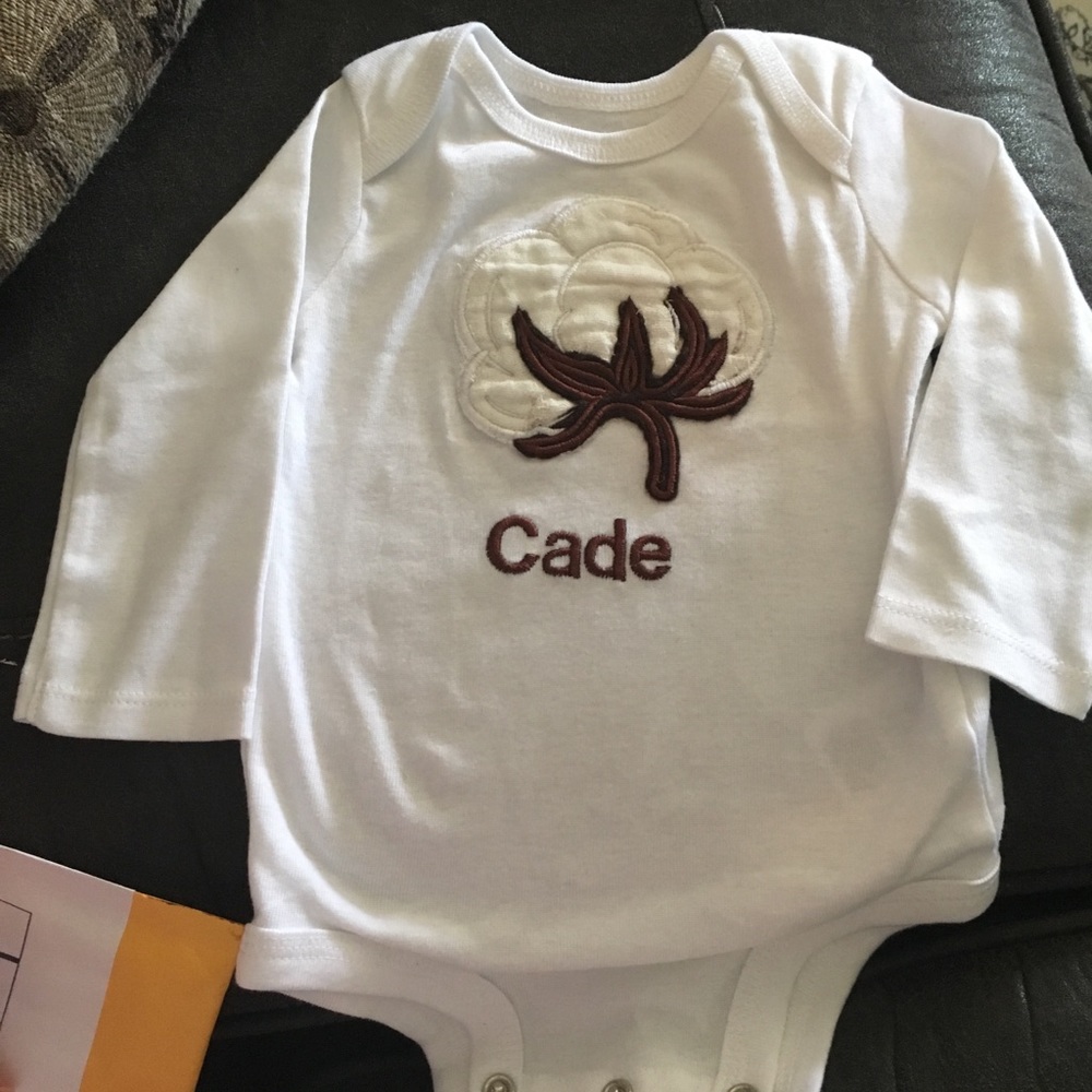 0-3 never worn Cade is monagramed on it